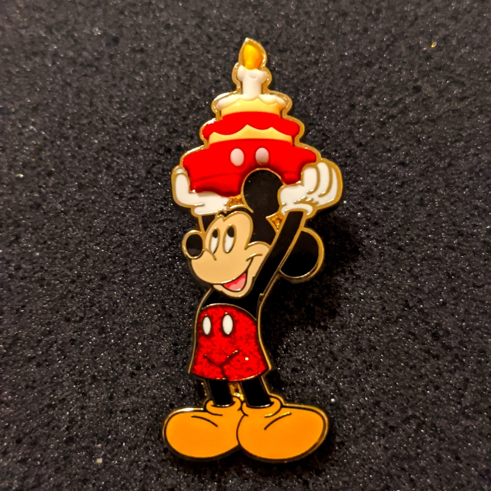 Disney Mickey Mouse holding birthday cake pin